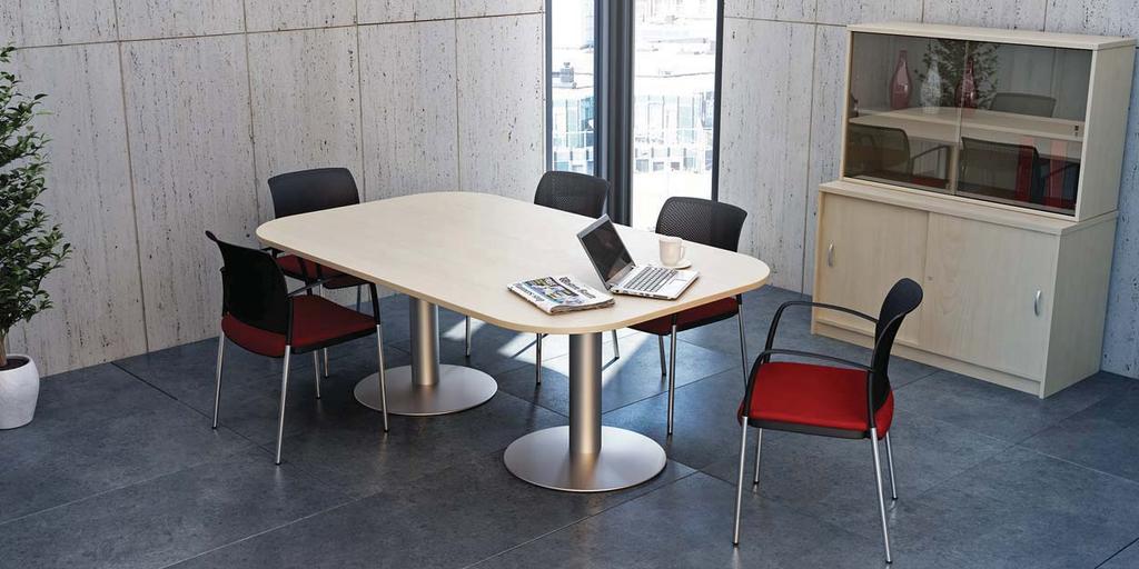 Meeting Table This meeting table offers smooth lines and curves to soften the look and feel. The top is supported by I-Frame legs and integrated modesty panel.