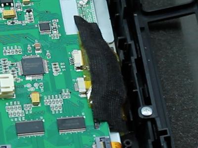 Place the second ESD tape strip over nav board. Use included cloth tape over ESD tape to secure it.
