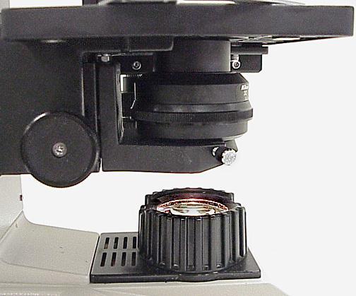 This photo shows the substage condenser of a microscope.