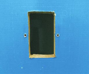INSTALLING THE ROOM MONITOR: Cut a rectangular hole in the wall for the mounting bracket as shown.