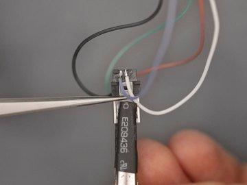 You can quickly reheat the any connection with a quick swiping motion to remove any solder bridging pads.