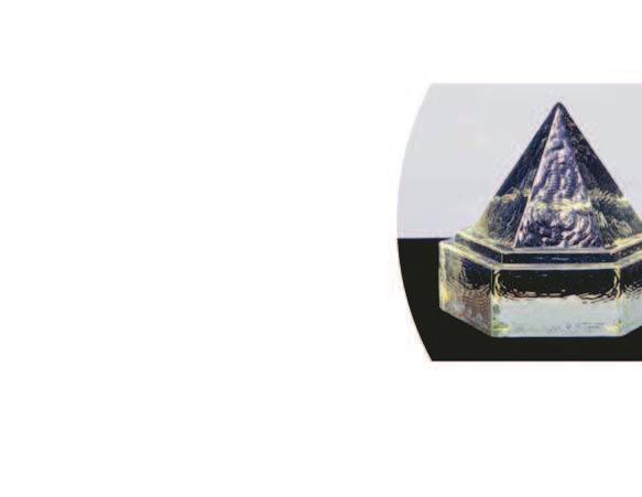 37. NAUTICAL PRISMS The nautical deck prism shown is composed of the following three solids: a regular hexagonal prism with edge length 3.5 inches and height 1.