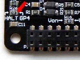 You can remove the resistor R26 (0 Ohm) and then connect the pad with HALT label to the GPIO pin you want.
