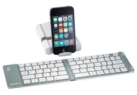 Aluminum protective keyboard cover easily converts into a stand for tablets and smartphones.