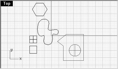 6 Make a window to select the polyline and the cylinder in the lower right part of the drawing. Only those objects that are completely inside the window are selected.