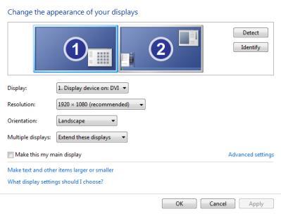 Using the following dialog, drag the monitors to the relative positions you desire.