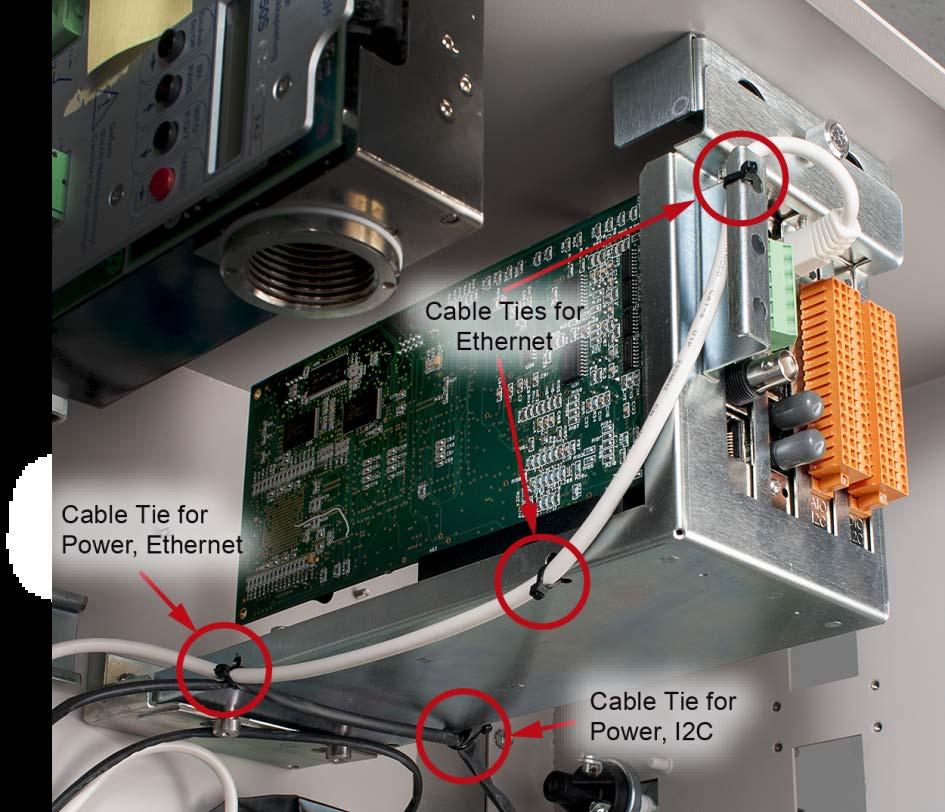 9. After connections are verified, install the IO tray in the normal operating position and secure with the captive thumbscrew. Figure 10.