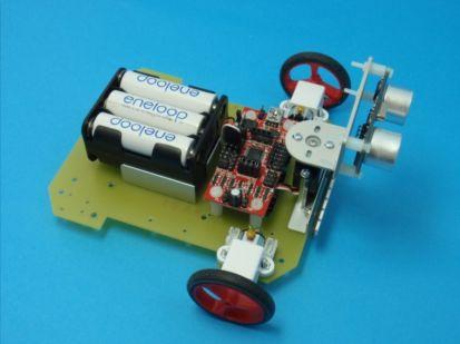 The user can choose two versions of the platform (2a and 2b). The two versions differ in the fixing place of the motors and wheels.