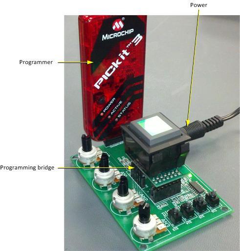 IS-S0108DEM Programming Procedure 2. Preparing the IS-S0108DEM for Programming The Programming Connector links the Single Switch Solution to the firmware programmer such as the PICKit 3 by Microchip.