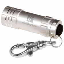 Micro 3-LED Flashlight Keychain Item #: IHGMHI9020-13 Features: Mini aluminum flashlight with latching key holder. Three ultra-bright LED bulbs. Rubber push button on/off switch on end.