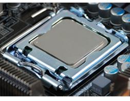 Remove the processor from its protective cover, making sure you hold it only by the edges.