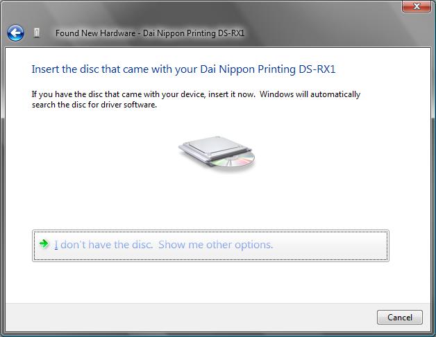 If the message Insert the disc that came with yuor Dai Nippon Printing DS-RX1 appears,