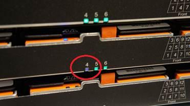 HSP 137 Replacing a disk drive in a Primary Storage Shelf or an Expansion Storage Shelf 5 Locate the drawer the faulty drive is in and pull both orange release levers into the center.
