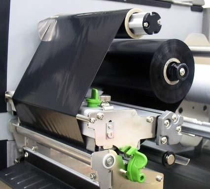 7. Close the print head mechanism making sure the latches are engaged securely.