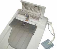 Unplug the cable, lift the ADF and pull it upwards to detach it from the copier. As was shown in the theory section, the construction of the module is very simple.