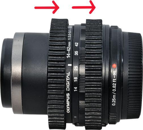 Use Zoom Control Button - 22 and Focus Control Button - 23 on the housing to adjust zoom and focus for this lens Panasonic LUMIX