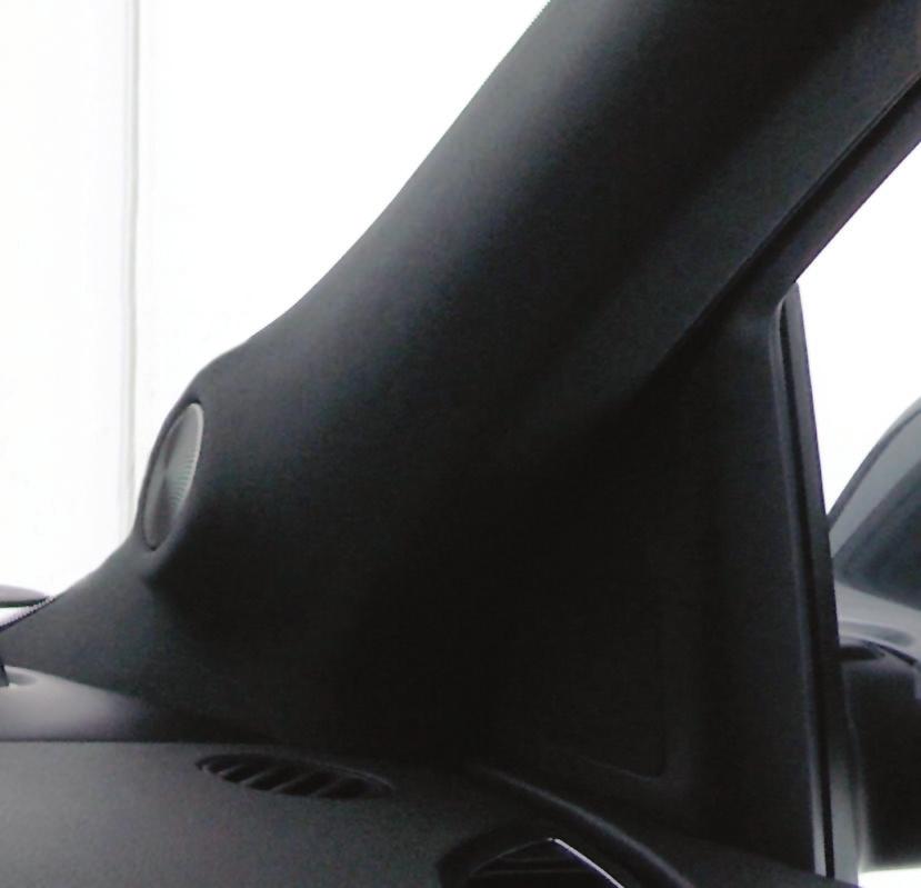 Figure 4: Height speakers integrated into Audi SUV passenger A-pillar (view is above dashboard with windshield to left and passenger window to right). 2.