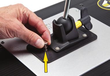 A locking pin will snap into place when the plate is properly seated.