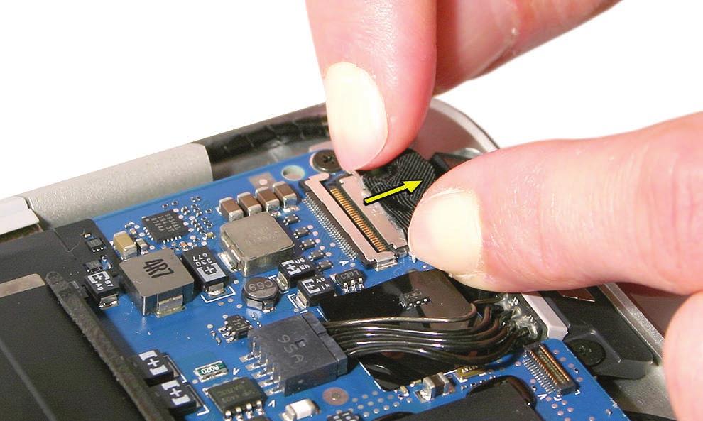 Remove the Phillips #000 screw that secures the LVDS cable ground clip. 2.
