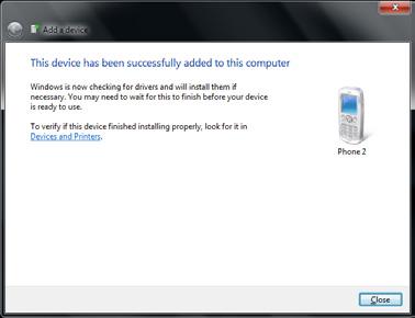 6. Windows will check for the device driver and install, if necessary. Tap Close to close the screen.