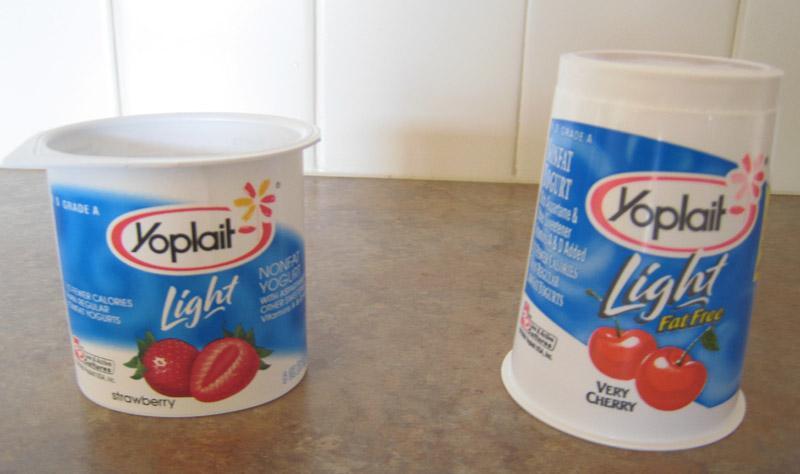 Yoplit with Ares nd Volumes Yoplit yogurt comes in two differently shped continers. One is truncted cone nd the other is n ellipticl cylinder (see photos below).