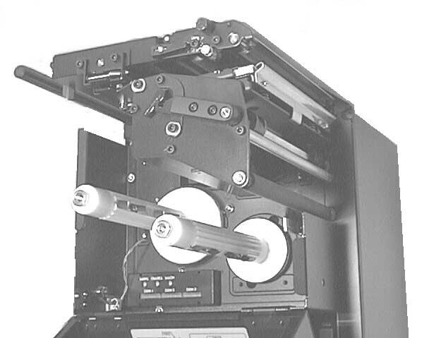 Section 2. Installation Loading the Label Stock 1. Open the print head by rotating the Head Latch until the head releases. It is spring-loaded in the open position. 2. Unlatch the Label Hold Down by lifting up on the latch.