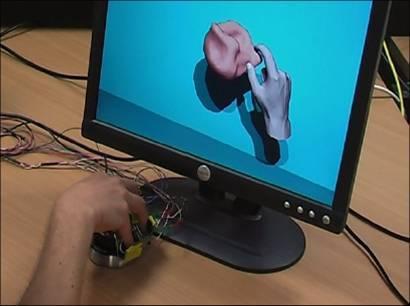 We then developed a new interaction device, called Hand Navigator as it is an extension of a space ball [20].