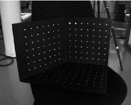 ) Fixed intrinsic parameters: In the first experiment, we use images of the calibration grid shown in Figure 8 observed by the same camera. Fig. 8. Three images of a calibration grid used in the experiment.