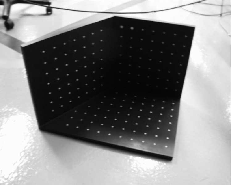 The model of the grid is used again as ground truth. Fig. 9. Three images of a calibration grid used in the experiment.