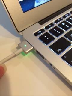 Charging the Laptop MagSafe Power Port: Magnetic port that will disconnect from the laptop if