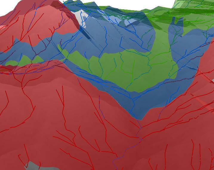 Again, notice how the hornfel (blue) streams are found in quartz diorite (green) and volcaniclastic