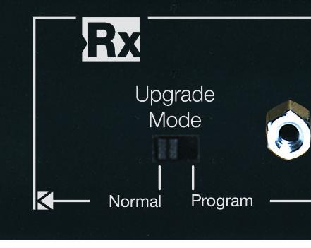 8 9 Firmware Updates: The Tx and Rx have an Upgrade Mode switch located near the RS- 232 port. The 2 position slide switch is marked Normal and Program.