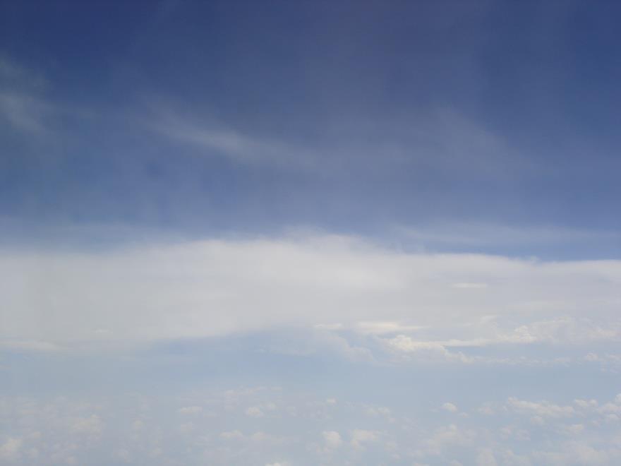 Figure 3 Photo of clouds taken from plane to illustrate objects and layers. This is compounded with layered documents.