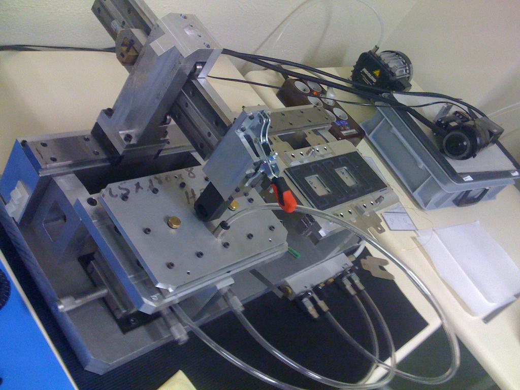 Figure 11: Picture of the manufacturing tool of the silicon module. 3.5.2 The quadrants and super-modules The next step of the manufacturing is the positioning of the module on the quadrant.