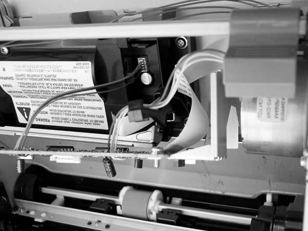 7. Carefully remove the ECU from the printer.