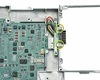 13. If replacing the battery transfer board, remove the two