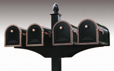 The post is configured to cantilever the mailbox forward, allowing more clearance beside and