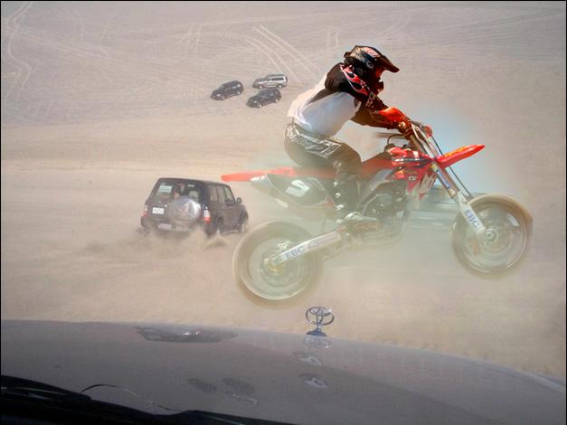Image compositing of a motorcyclist.
