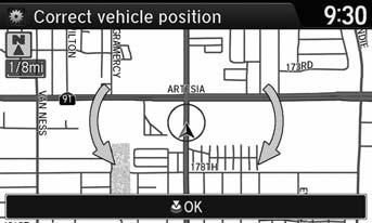Scroll the map to position the cursor over at your correct position. Press u. 4. Rotate i to position the arrowhead in the correct direction the vehicle is facing. 5. Press u to select OK.