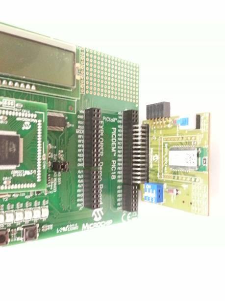 NOTE: Ensure that the BM77 module on the board is facing the PIC PIM while inserting the