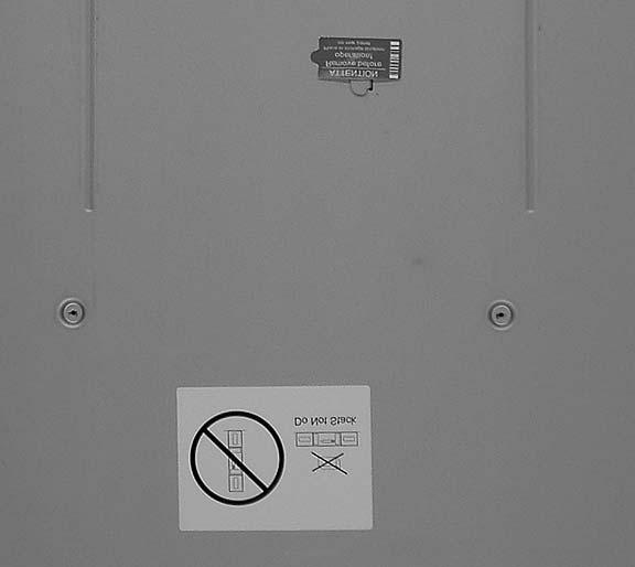 1 2 a77ug018 Figure 1-2. Shipping lock and label 2. Store the lock ( 1 ) and label ( 2 ) on the rear panel of the library as shown in Figure 1-3.