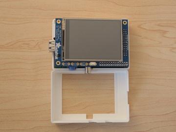 With the camera and pi mounted to the pitouchtop part, flip the the