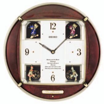 $250-495 QXJ004BLH $250 Carriage clock with hand-rubbed finish Ornate metal dial features