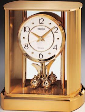 Curio clock Glass cabinet doors 26 1 4" x 20 1 4" x 6 3 4" QHG033GLH $300 Gold-tone metal and