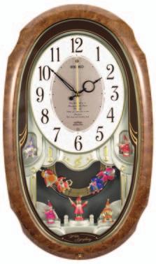 brown solid oak Curved glass crystal 21" x 13" x 4" QXM116BRH $195 On the hour, the clock