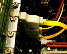 Insert the SATA signal cable and SATA power cable securely into the corresponding
