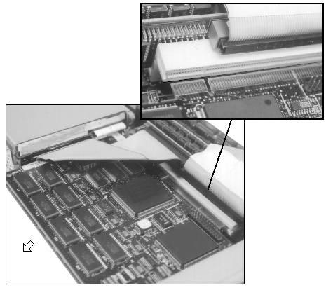Remove the screw holding the PCI option in place. 3.