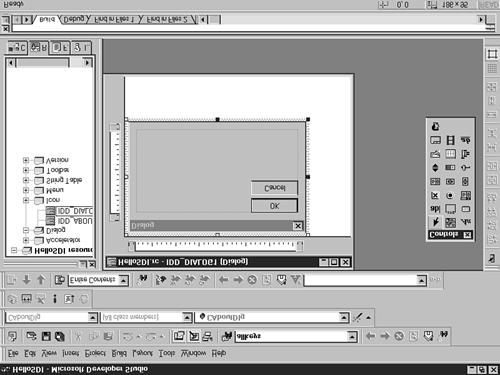 figure 4.2 The Developer Studio dialog box editor. The dialog box that is displayed for editing initially contains two button controls, one labeled OK and another labeled Cancel.
