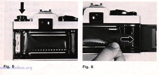 5. Draw the film leader across the camera back and insert it into one of the slits of Film Take-up Spool (28) (Fig. 6). To bring the slit into a convenient position.