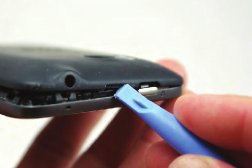 Use the plastic opening tool to lift and remove the battery from the HTC Thunderbolt 4G.